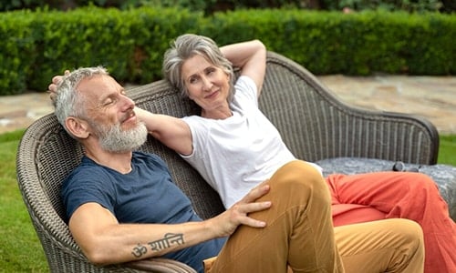 senior couple sitting and having rest 