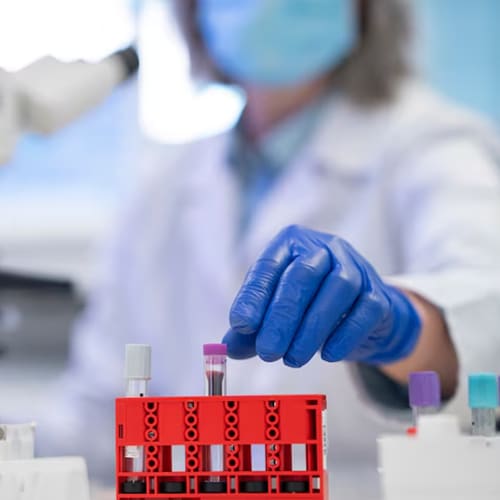 Doctor performing medical research in lab