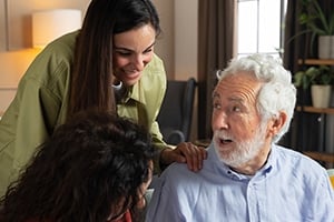 People taking care of Parkinson's patient at home